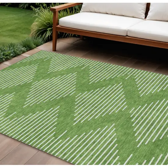 Green And Ivory Geometric Washable Indoor Outdoor Area Rug Photo 1