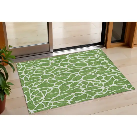 Green And Ivory Geometric Washable Indoor Outdoor Area Rug Photo 1