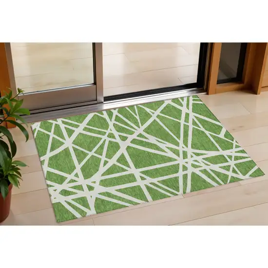 Green And Ivory Geometric Washable Indoor Outdoor Area Rug Photo 1