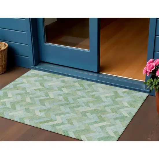 Green And Ivory Geometric Washable Indoor Outdoor Area Rug Photo 1