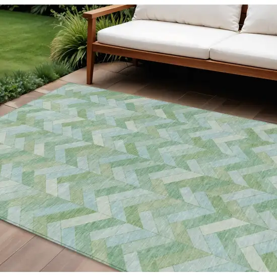 Green And Ivory Geometric Washable Indoor Outdoor Area Rug Photo 1