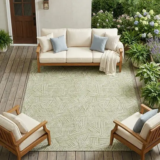 Green And Ivory Geometric Washable Indoor Outdoor Area Rug Photo 1