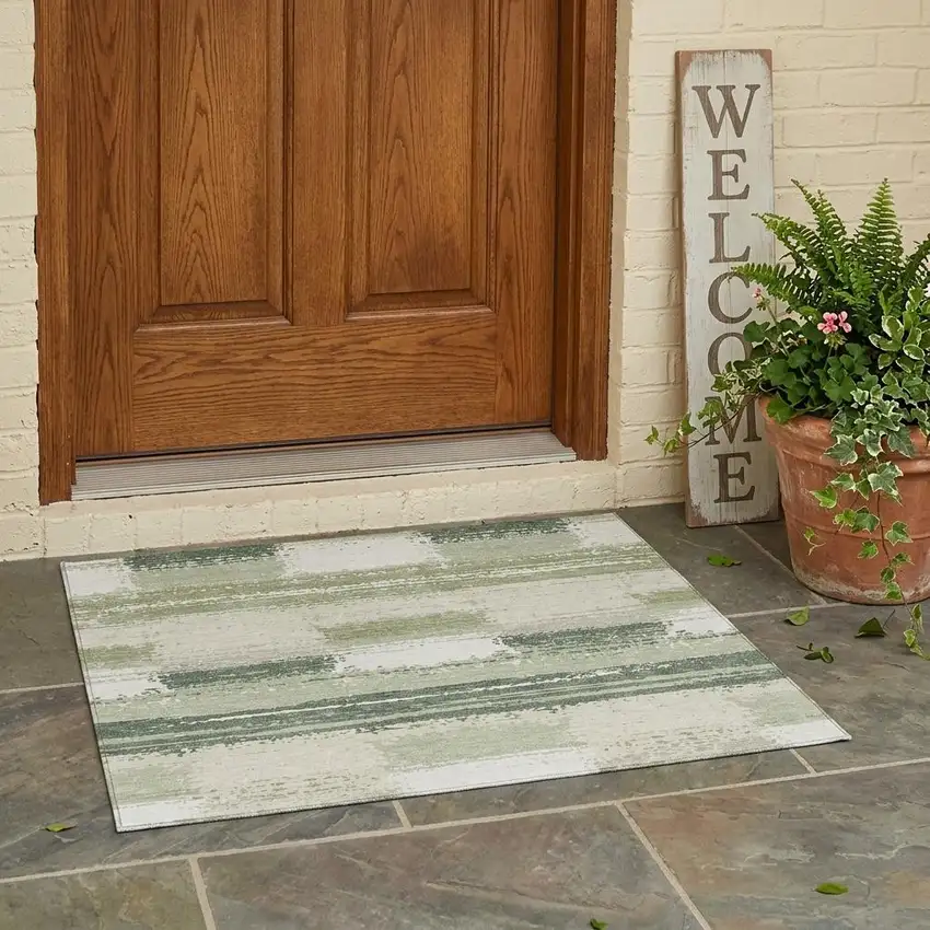Green And Ivory Geometric Washable Indoor Outdoor Area Rug Photo 1