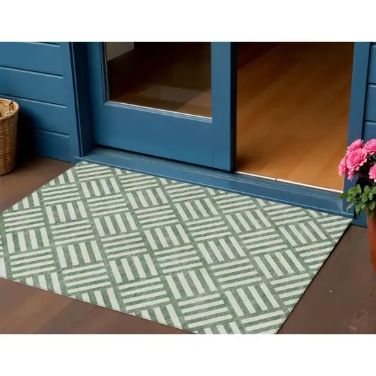 Green And Ivory Geometric Washable Indoor Outdoor Area Rug Photo 1