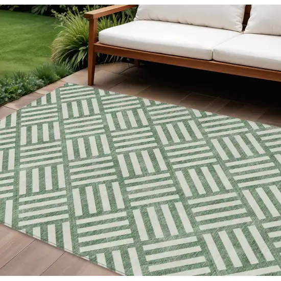 Green And Ivory Geometric Washable Indoor Outdoor Area Rug Photo 1