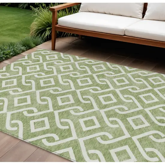 Green And Ivory Geometric Washable Indoor Outdoor Area Rug Photo 1