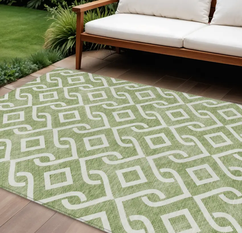 Green And Ivory Geometric Washable Indoor Outdoor Area Rug Photo 1