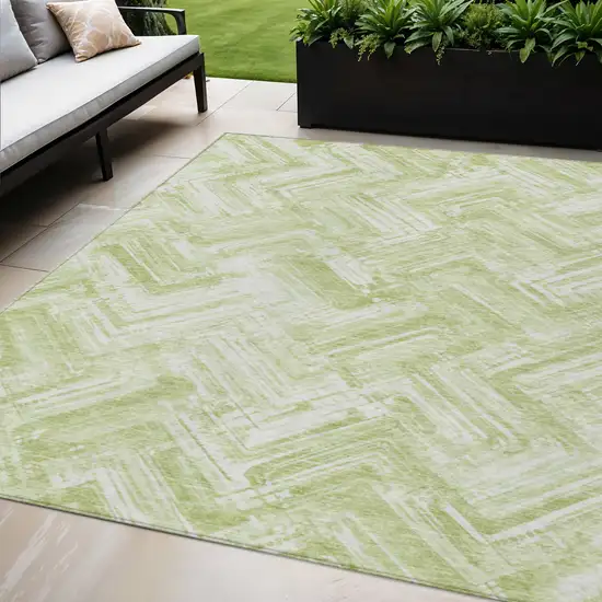 Green And Ivory Geometric Washable Indoor Outdoor Area Rug Photo 1