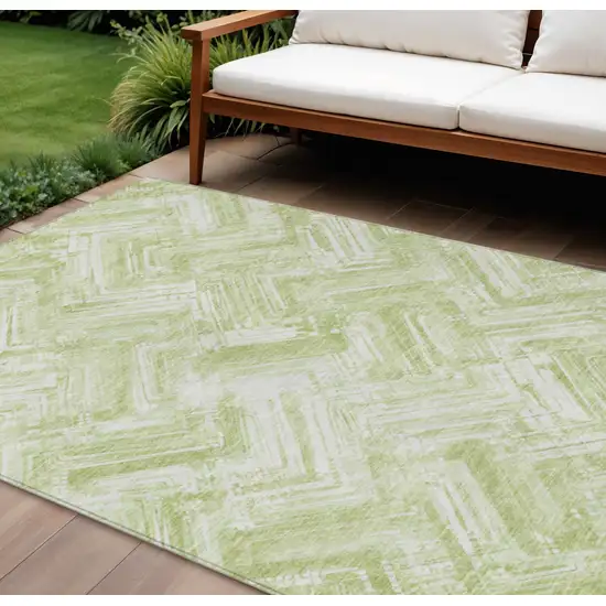 Green And Ivory Geometric Washable Indoor Outdoor Area Rug Photo 1