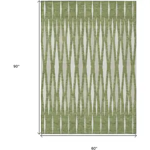 Photo of Green And Ivory Geometric Washable Indoor Outdoor Area Rug