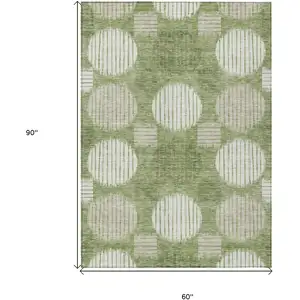 Photo of Green And Ivory Geometric Washable Indoor Outdoor Area Rug