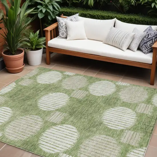 Green And Ivory Geometric Washable Indoor Outdoor Area Rug Photo 1