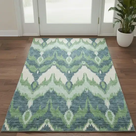 Green And Ivory Ikat Washable Area Rug With UV Protection Photo 2