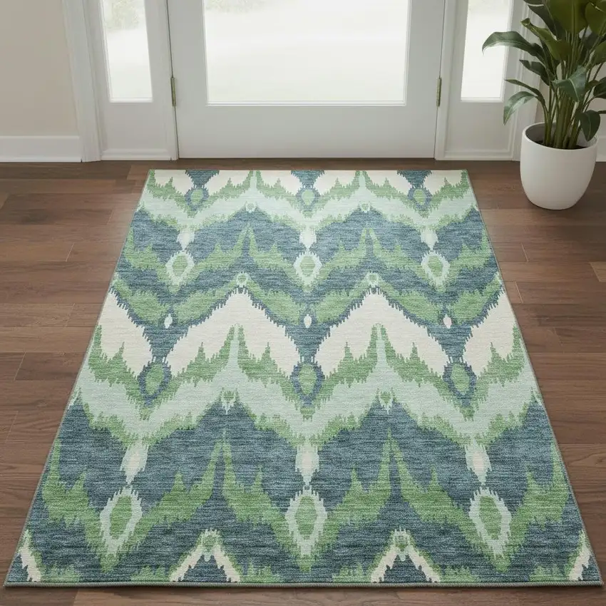 Green And Ivory Ikat Washable Area Rug With UV Protection Photo 2