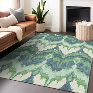 Photo of Green And Ivory Ikat Washable Area Rug With UV Protection