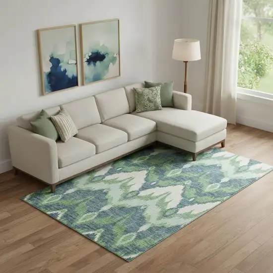 Green And Ivory Ikat Washable Area Rug With UV Protection Photo 1