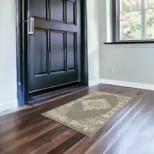 Photo of Green And Ivory Medallion Distressed Area Rug