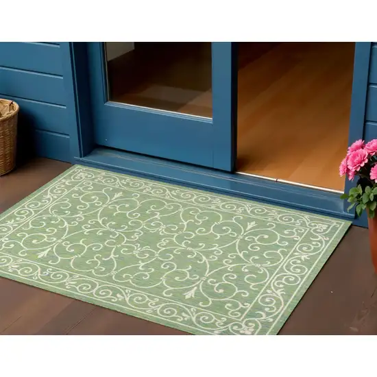 Green And Ivory Medallion Indoor Outdoor Area Rug Photo 1