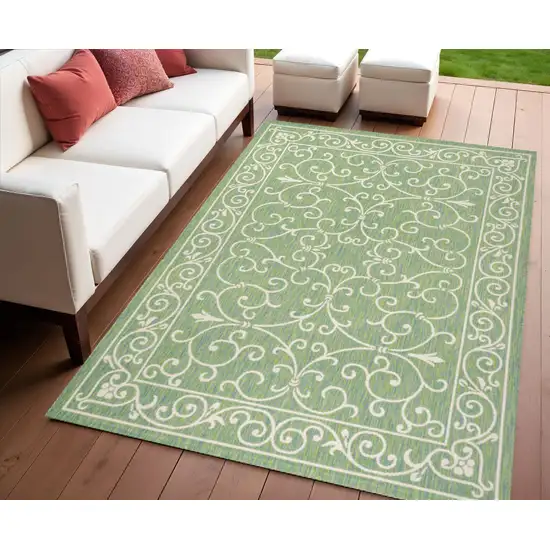 Green And Ivory Medallion Indoor Outdoor Area Rug Photo 1