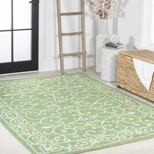 Photo of Green And Ivory Medallion Indoor Outdoor Area Rug