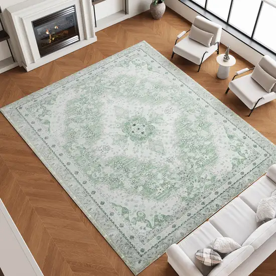 Green And Ivory Oriental Distressed Washable Area Rug Photo 5