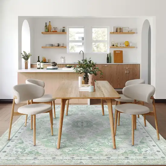 Green And Ivory Oriental Distressed Washable Area Rug Photo 7