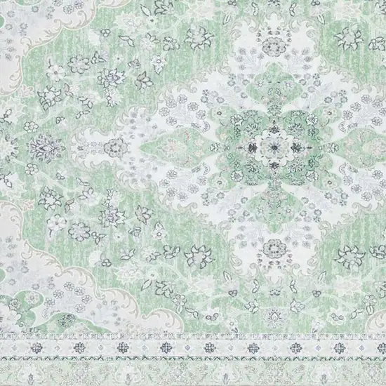 Green And Ivory Oriental Distressed Washable Area Rug Photo 3