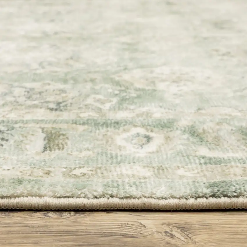 Green And Ivory Oriental Power Loom Stain Resistant Area Rug Photo 9