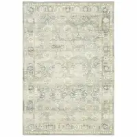 Photo of Green And Ivory Oriental Power Loom Stain Resistant Area Rug