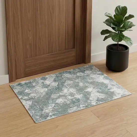 Green And Ivory Patchwork Distressed Stain Resistant Area Rug Photo 1