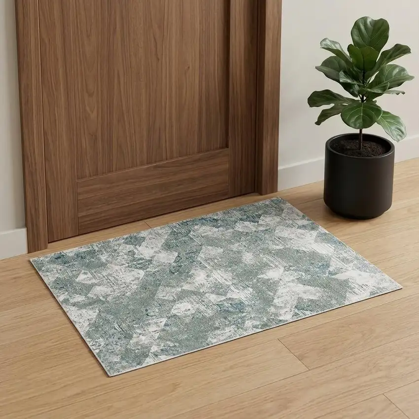 Green And Ivory Patchwork Distressed Stain Resistant Area Rug Photo 1