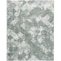 Photo of Green And Ivory Patchwork Distressed Stain Resistant Area Rug