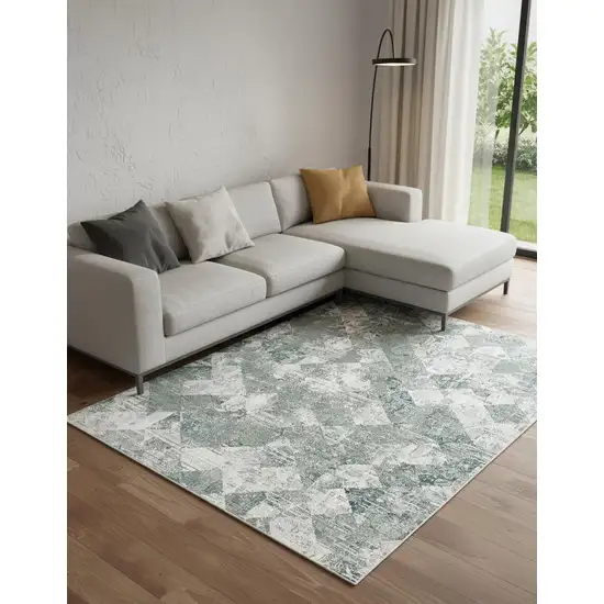 Green And Ivory Patchwork Distressed Stain Resistant Area Rug Photo 1