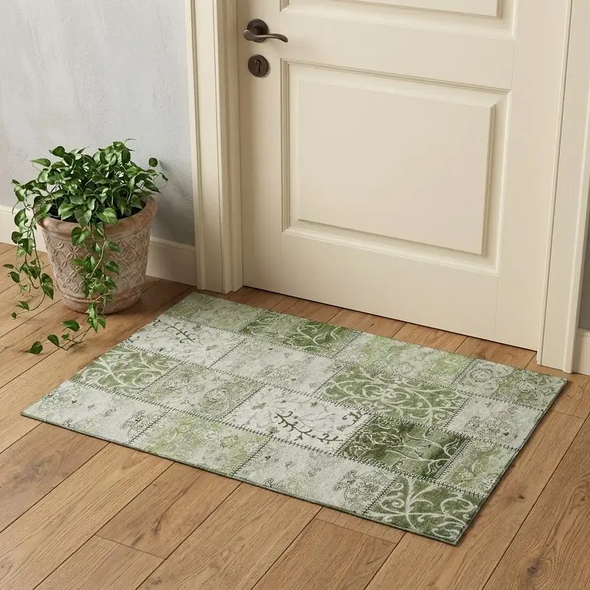 Green And Ivory Patchwork Distressed Washable Area Rug With UV Protection Photo 1