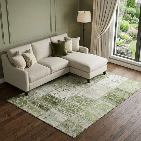 Green And Ivory Patchwork Distressed Washable Area Rug With UV Protection Photo 1