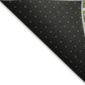 Photo of Green And Ivory Plaid Washable Area Rug With UV Protection