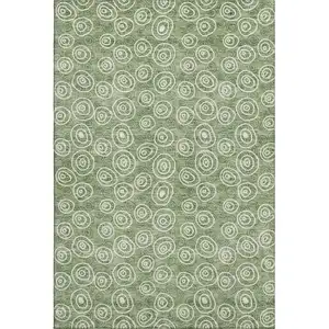 Photo of Green And Ivory Polka Dot Washable Area Rug With UV Protection