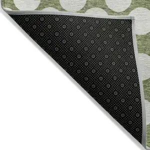 Photo of Green And Ivory Polka Dot Washable Indoor Outdoor Area Rug