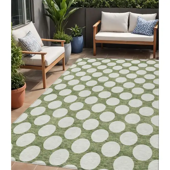 Green And Ivory Polka Dot Washable Indoor Outdoor Area Rug Photo 1