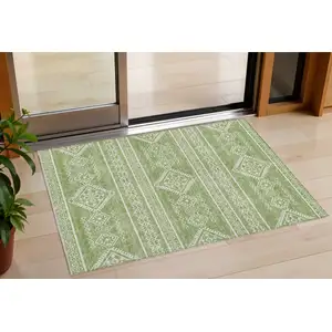 Photo of Green And Ivory Southwestern Washable Indoor Outdoor Area Rug