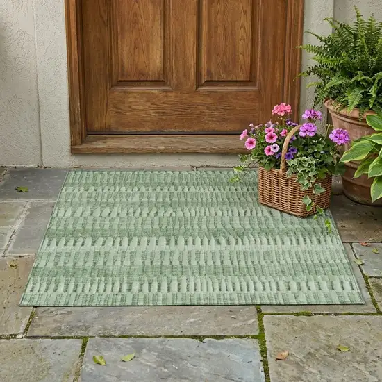 Green And Ivory Striped Washable Indoor Outdoor Area Rug Photo 1