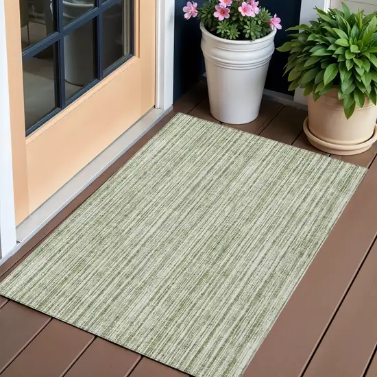 Green And Ivory Striped Washable Indoor Outdoor Area Rug Photo 1