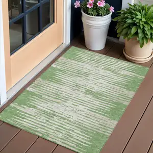 Photo of Green And Ivory Striped Washable Indoor Outdoor Area Rug