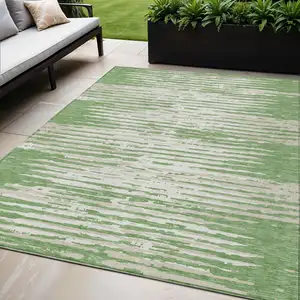 Photo of Green And Ivory Striped Washable Indoor Outdoor Area Rug