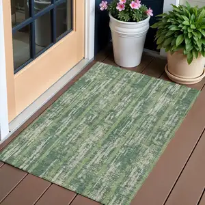 Photo of Green And Ivory Striped Washable Indoor Outdoor Area Rug