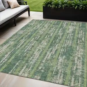 Photo of Green And Ivory Striped Washable Indoor Outdoor Area Rug