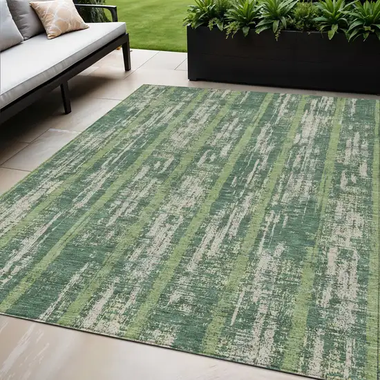 Green And Ivory Striped Washable Indoor Outdoor Area Rug Photo 1