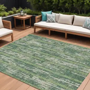 Photo of Green And Ivory Striped Washable Indoor Outdoor Area Rug