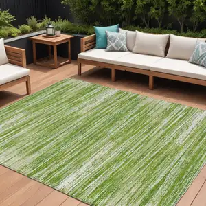 Photo of Green And Ivory Striped Washable Indoor Outdoor Area Rug