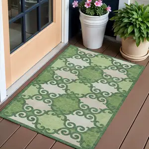 Photo of Green And Ivory Trellis Washable Indoor Outdoor Area Rug
